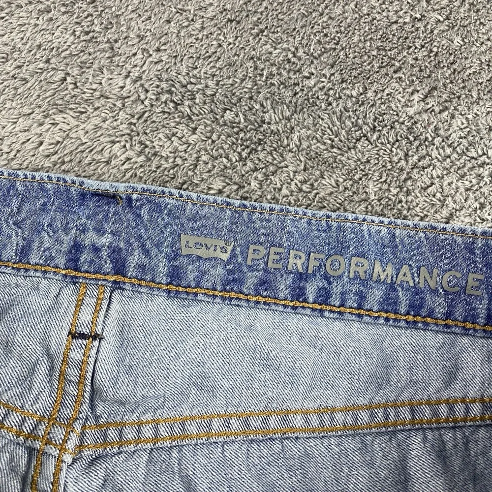 Levis Premium Performance 511 Slim Fit Jeans Mens 33x34 Blue Light Wash Low Rise